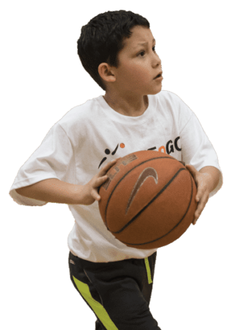 boy playing basketball